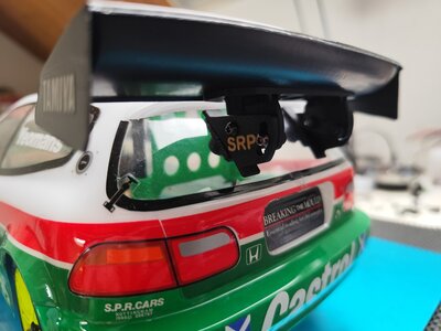 Spoiler Holder adjustable for hatcback bodies